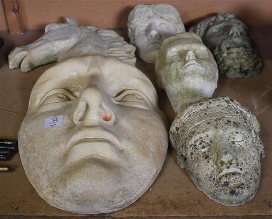 6 stone heads(-)